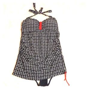 One piece swimsuit with skirt